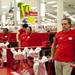 Target cashiers wait for customers to enter the store on Thursday. There were more than 55 employees tonight. Daniel Brenner I AnnArbor.com